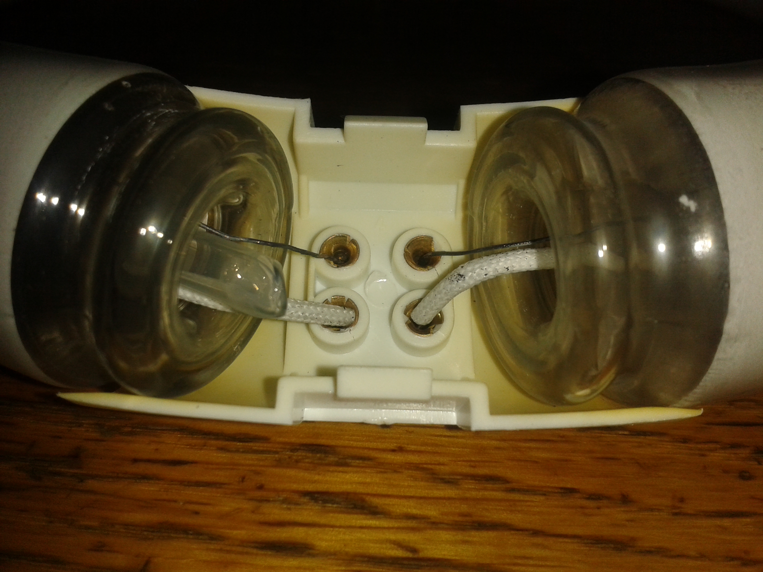 How can a fluorescent lamp run without a ballast? Electrical